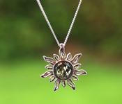 Radiant Sun Pendant – 925 Sterling Silver with Green Baltic Amber