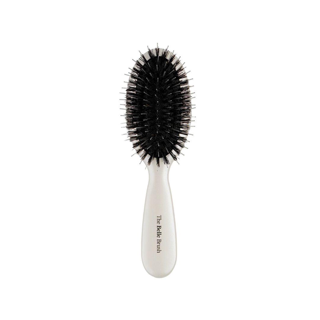 The Belle Brush Smoothing Brush with Black Bristles and White Handle for All Hair Types