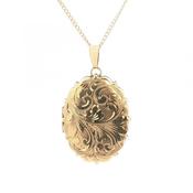 Ladies Large Oval Ornate Motif Serrated Edge Locket in 9ct Yellow Gold