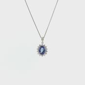 Vintage Platinum Oval 2.98 Tanzanite and 0.69 Diamond Cluster Pendant and Chain image