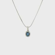 Vintage Oval Sapphire and Natural Diamond Halo Pendant 18ct White Gold image
