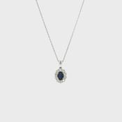 Oval Sapphire and Natural Diamond Cluster Pendant in 18ct White Gold image