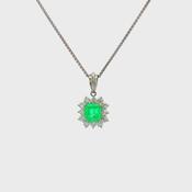 Vintage Emerald And Diamond Cluster Pendant Set In Platinum.