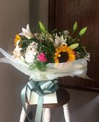 A Luxurious Lily Mix Hand-tied bouquet. image