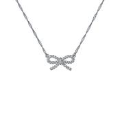 ted baker ribah: crystal silver tone ribbon bow pendant