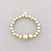 Muted gold elasticated ball bracelet 954 1 image