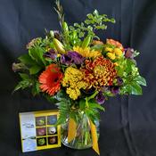 Autumn Glow in a  Vase with Chocolates.
