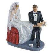 Bride &amp; Groom Putting on Shoe