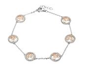 Silver CZ circle drop bracelet with six rose gold plated newgrange spiral