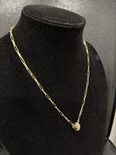 Corona Fine Gold Necklace With A Circular Pendent Embellished With Diamontes
