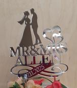 BRIDE AND GROOM ON SWASH WITH SURNAME AND DATE CAKE TOPPER