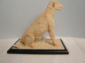"The Chewed Rug" Sitting Irish wolfhound.