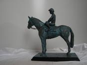 " Saddled Up " horse and jockey sculpture. image