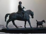 " Chasing The Drag " Rider on horse with hound.