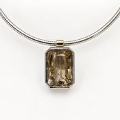 Silver and 9ct yellow gold pendant with rutilated quartz