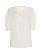 MANTU V-NECK BLOUSE WITH TIE DETAIL IN IVORY image