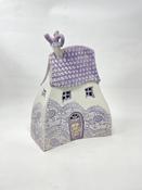 Pale Purple and White House