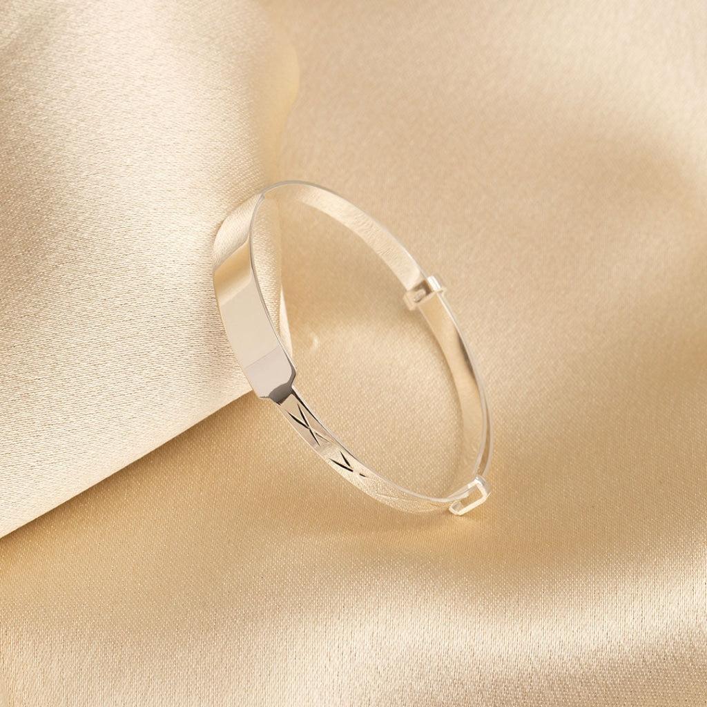 Bangle top with engraving
