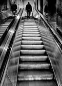 Man on escalator