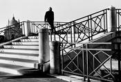 Man on a bridge image