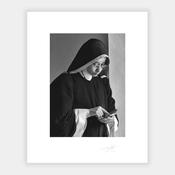 Nun with a phone image