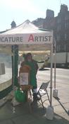 Dan at work at 'Yourface Gazebo' on the corner of Dame Street and Fownes street in Dublin 2 from 10am to 6pm Thursdays through Sundays -weather permitting. image