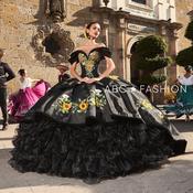 Black and gold hotsell quinceanera dresses image