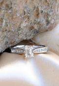 18kt White Gold 0.70ct Emerald Cut Solitaire &amp; 0.17ct Diamond Shoulder Ring image