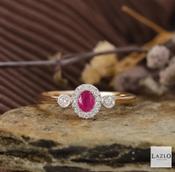 9kt Yellow Gold Oval Ruby &amp; 0.10ct Diamond Halo Dress Ring image