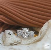18kt Rose Gold 1.83ct Three Stone Oval &amp; Two Round Laboratory Diamond Engagement Ring image