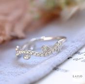 18kt White Gold Shaped Castille 0.36ct Diamond Band &amp; Rubover Marquis &amp; Pear Diamond Ring image