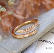 18kt Rose Gold Grain Set Crossover 0.20ct Baguette Diamond Ring image