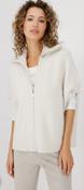 KNITTED CAPE WITH CABLE PATTERN
COLOR: Oat milk