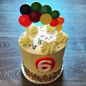 Tall Tier Buttercream Baloons Cake
