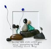 SMALL 17S   Family on Rocks - 'You're not Rich until you have something that money can't buy'
