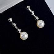 Pearl and diamond drop earrings image
