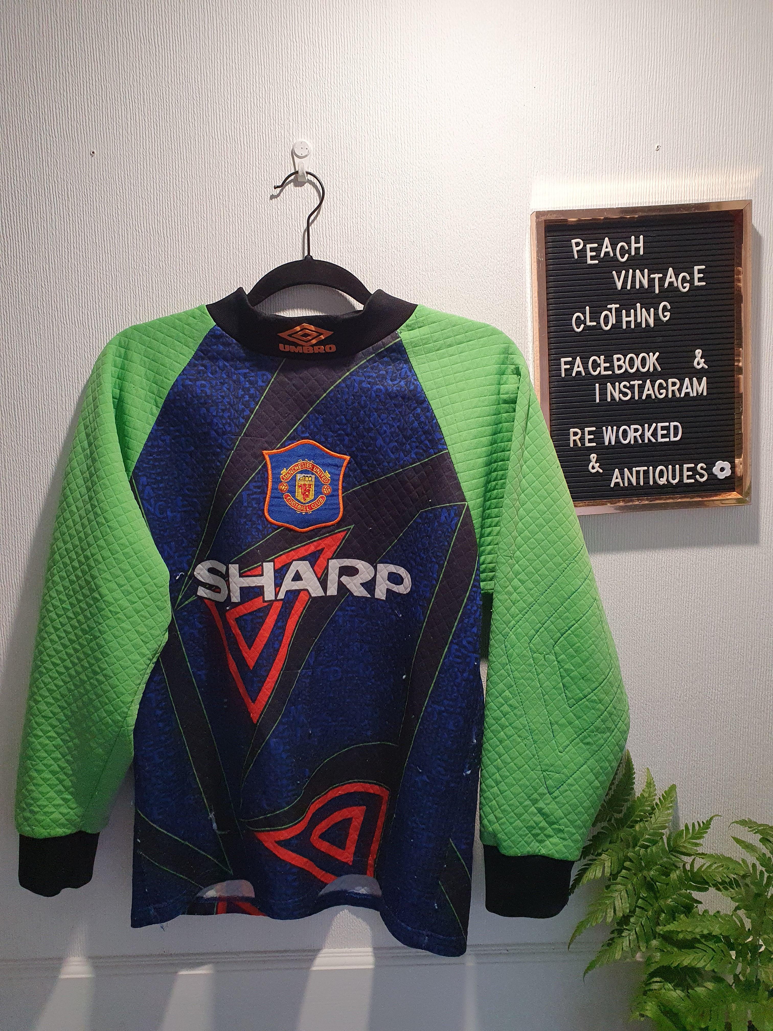 Manchester united clearance peach jersey