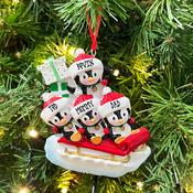 Penguin Sleigh Family of 4 Personalised Christmas Decoration image