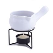 Ceramic wax pot with candle image