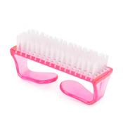 Medium pink manicure and dust brush