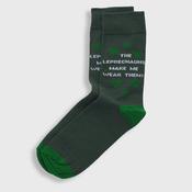 "The Leprechauns make me wear them! "Green socks