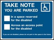 Parked in disabled spot or across disabled access point. Sticker