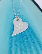 Paw print silver necklace - medium wavy heart image