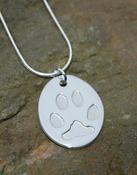 Paw print silver oval necklace - medium image