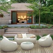 Outdoor sofa set with a combination of rattan chairs and a coffee table, perfect for living rooms, patios, and villas, featuring rattan furniture. image