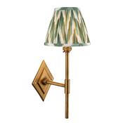 elegant brass patina tall arm wall light with Cotswold green zigzag patterned fabric shade - Stillorgan Decor image
