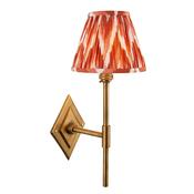elegant brass patina tall arm wall light with apricot orange zigzag patterned fabric shade - Stillorgan Decor
