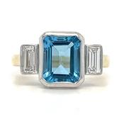 9ct Yellow Gold Laboratory Grown 4.29ct Emerald Cut Topaz And 0.44ct Side Baguette Diamond Ring image
