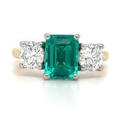 18ct Yellow Gold Laboratory Grown 2.50ct Radiant Cut Emerald and Round Brilliant Three Stone Diamond Ring image