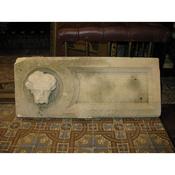 A pair of sandstone heads